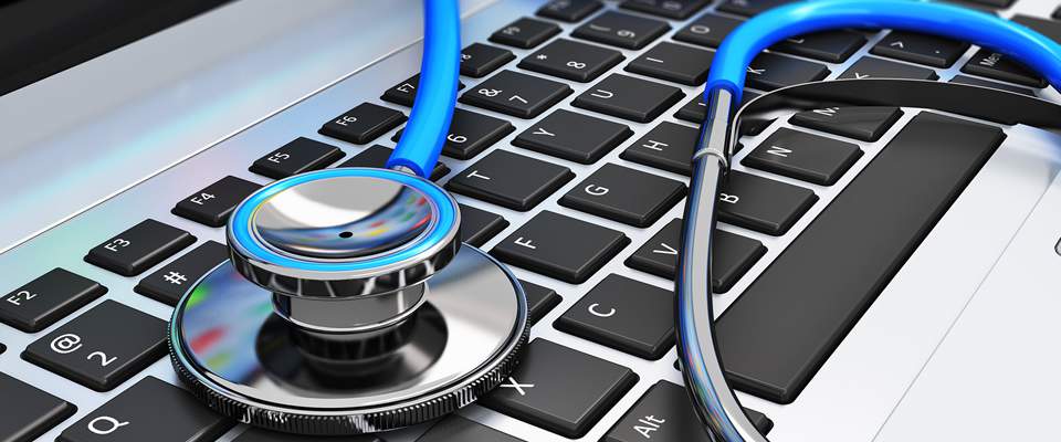 Laptop i slušalice – Ordinacija Alfa